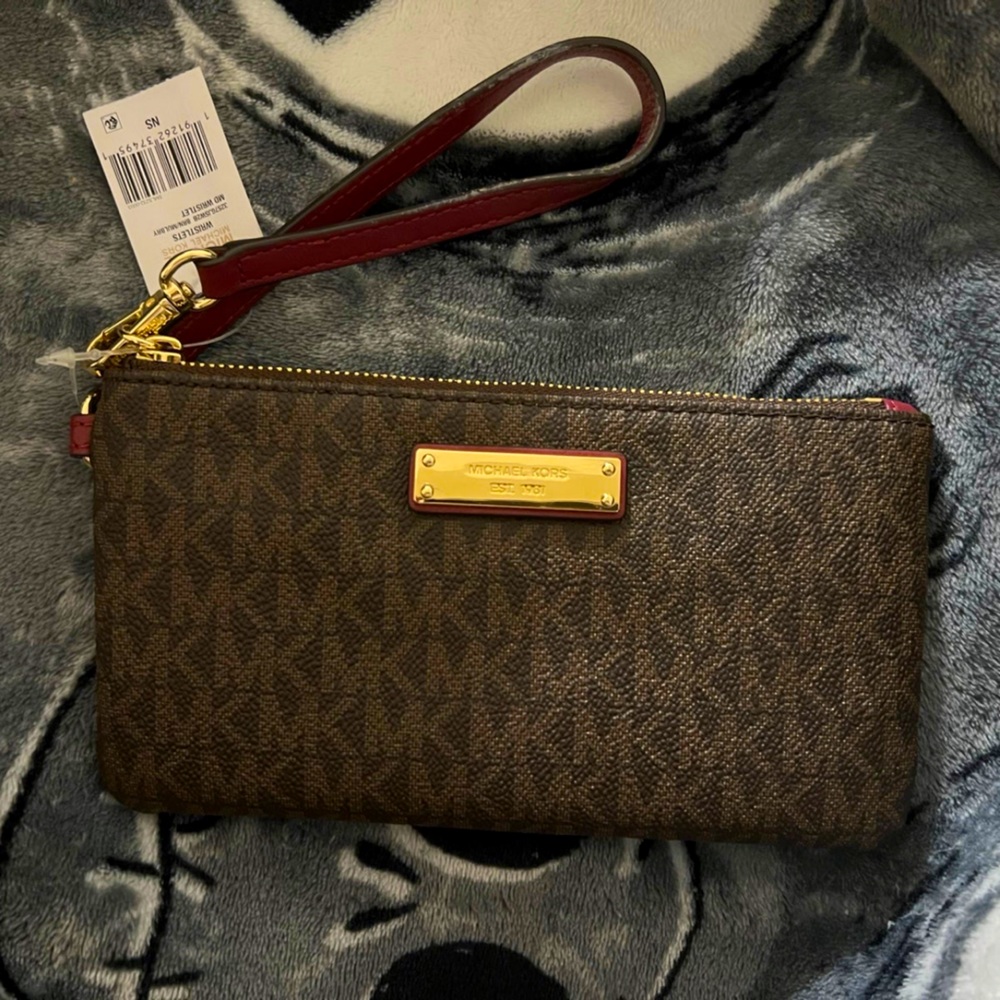 NWT Michael Kors dark brown with red accents and gold hardware wristlet